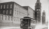 Street car in front of the 1874 Social Mill at the turn of the century (Woonsocket Harris Public Library)
